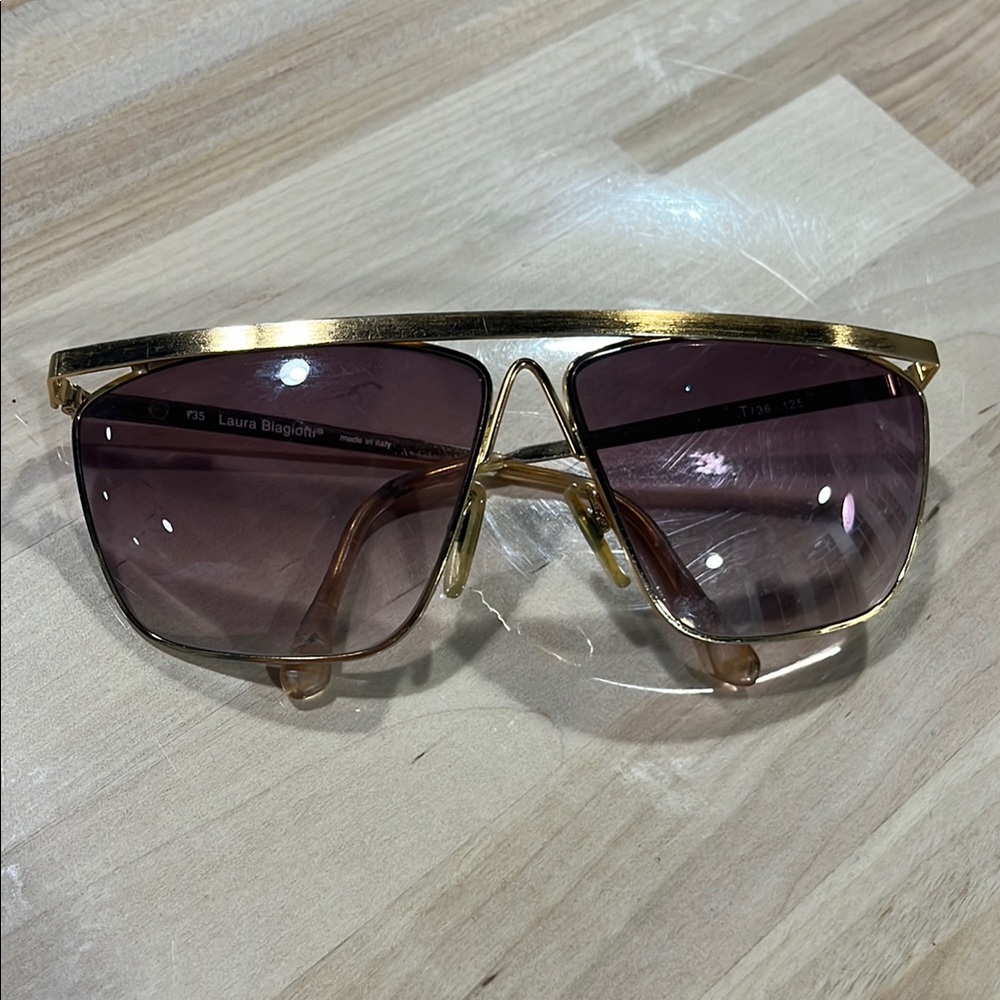 Laura Biagiotti Gold Sunglasses with brownish Purple Lenses prescription